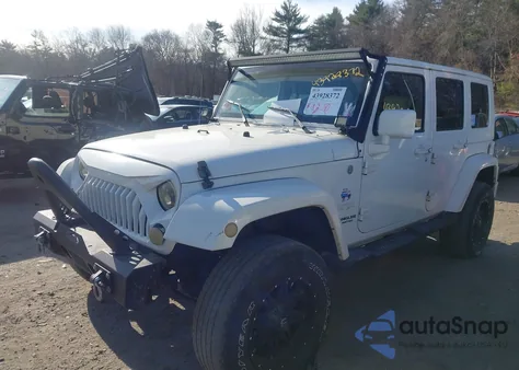 2010 Jeep Wrangler Unlimited Sahara z USA, uszkodzony, nr VIN 1J4BA5H12AL183718